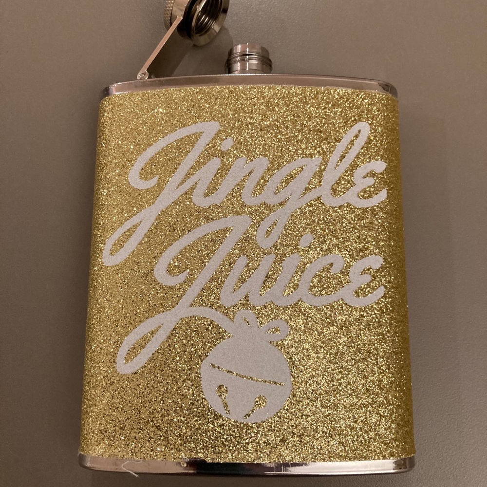 CHRISTMAS “JINGLE JUICE”         7 ounce FLASK in excellent condition.